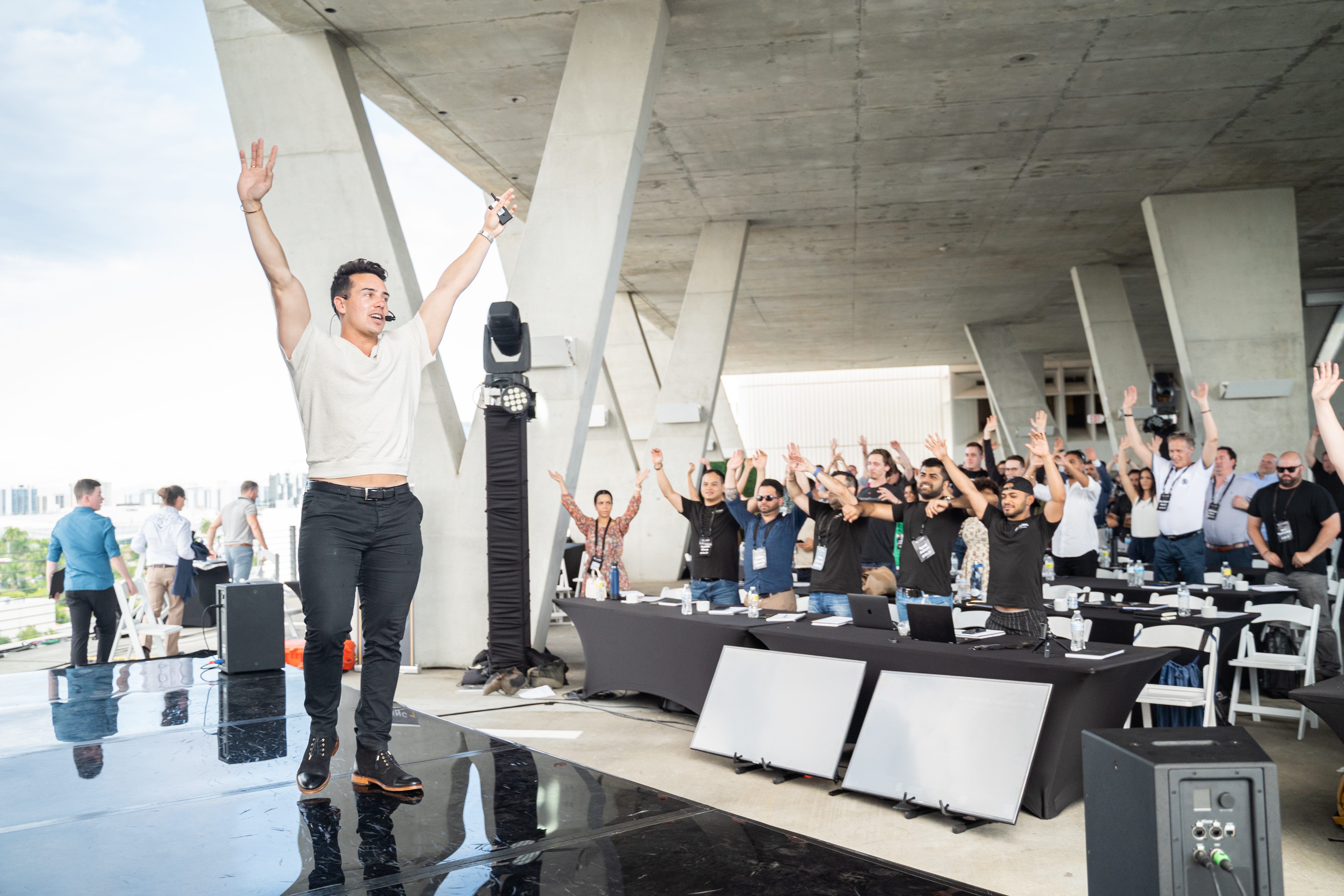 Ravi Abuvala on stage at the Scaling With Systems live event — 2022